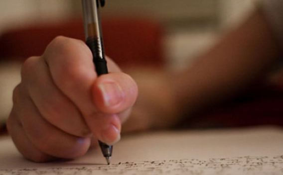 Hand writing with a pen