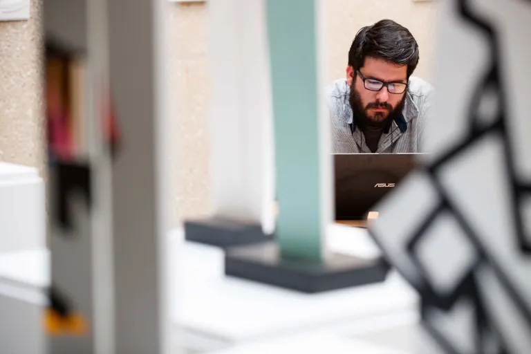 Person looking at laptop
