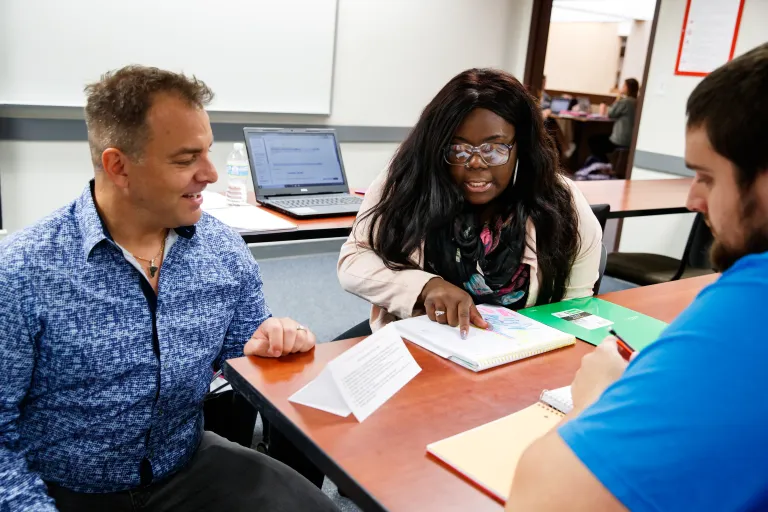 Professor talking to students during Anthropology and Sociology class.