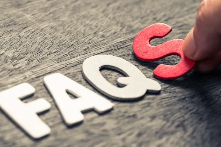 Puzzle piece letters F, A, Q and S