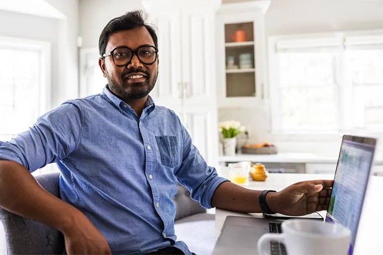 Adult male student at his laptop