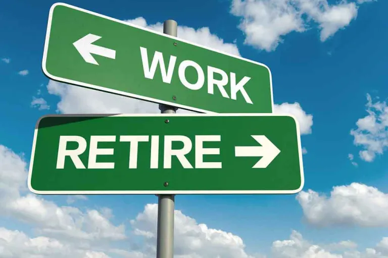 Image of clouds and street signs that read "retire" and "work"