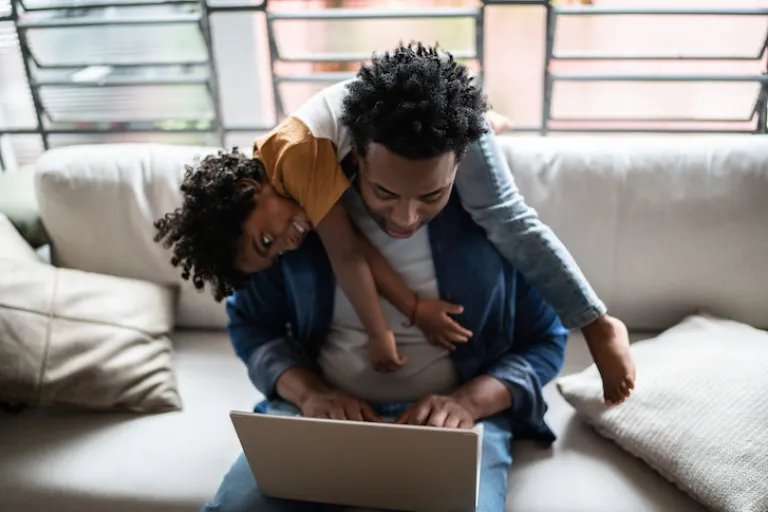 Father and Child with Laptop