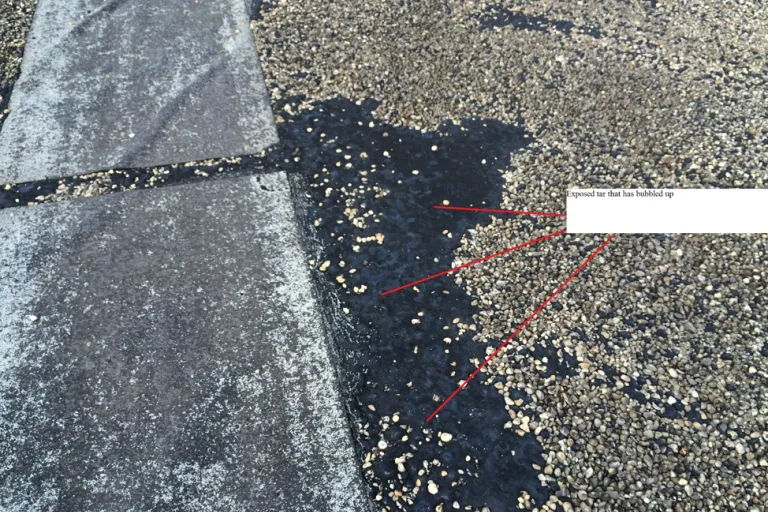 Exposed Tar Deterioration on "A" Roof