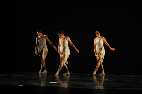 Three dancers performing in the Center for Performing Arts