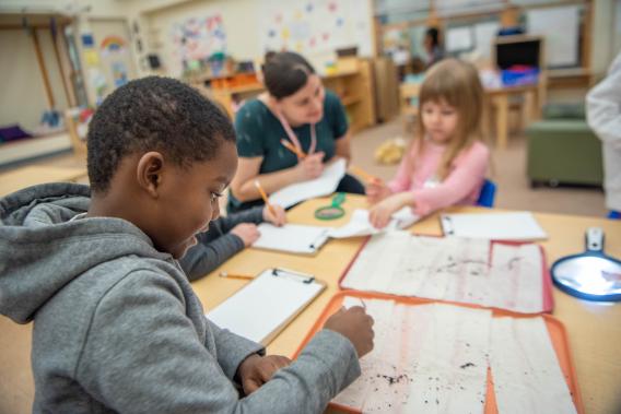 Two children engaged in learning