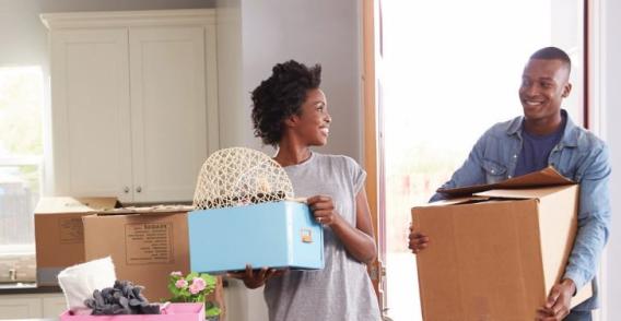 a couple moving into a new home