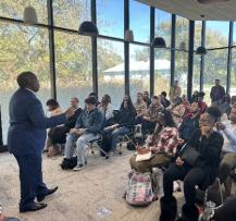 a man speaking to an audience