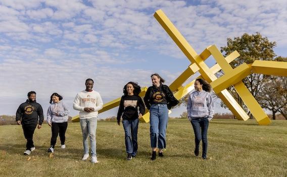 GovState students walking through the Nathan Manilow Sculpture Park