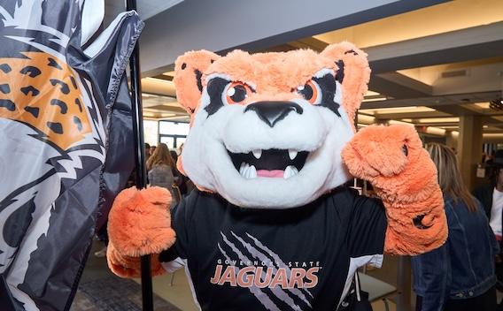 Jax holding a GovState flag.