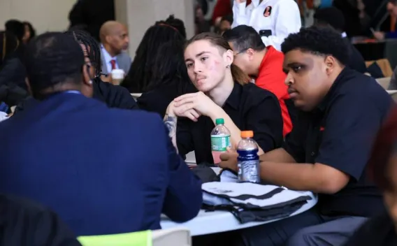 SXL students meeting with a vendor