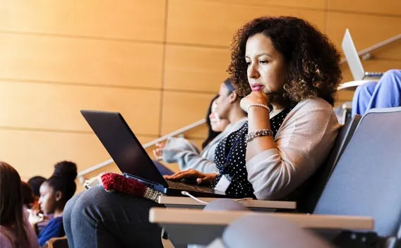 Adult student at her laptop