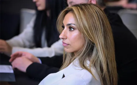 Honors student listening in a meeting