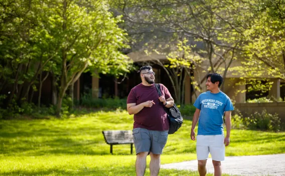 Students walking outside and talking