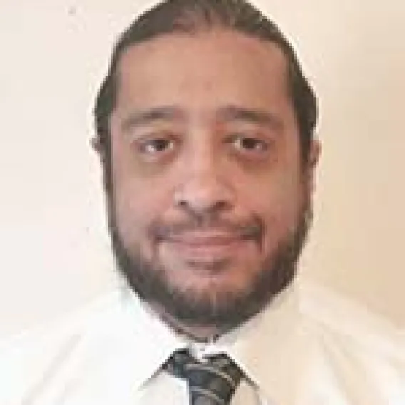 male  beard, white shirt, grey tie 